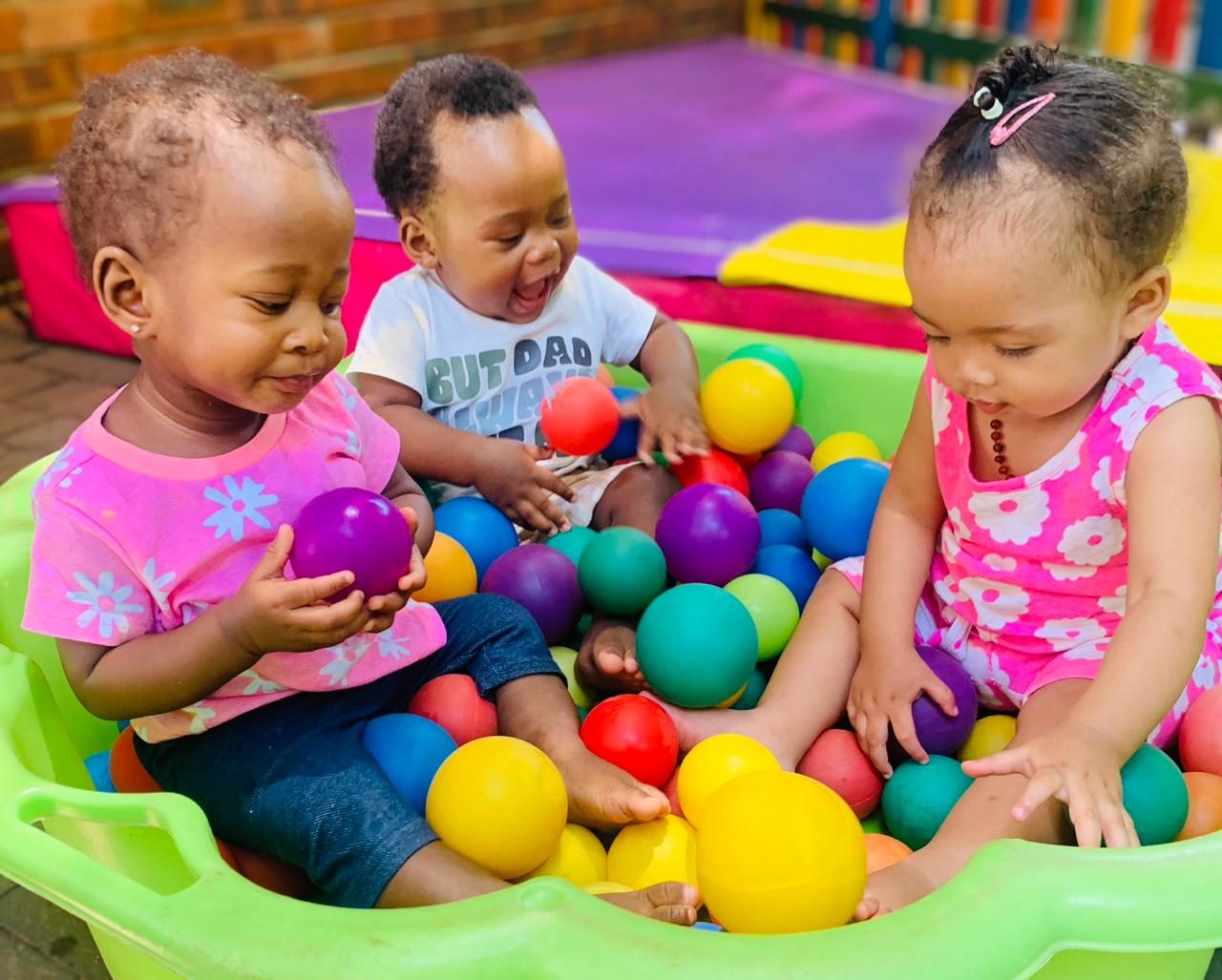Toddlers playing together in the ball pit at the Baby & Toddler Centre
